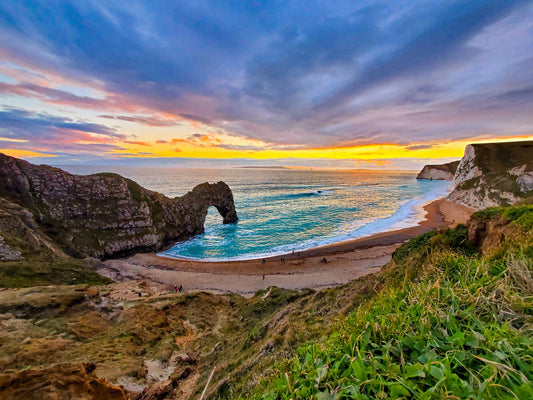 Durdle Door limestone arch at sunset on England's Jurassic Coast